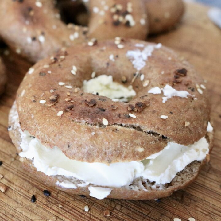 one healthy whole grain bagel sandwich with cream cheese
