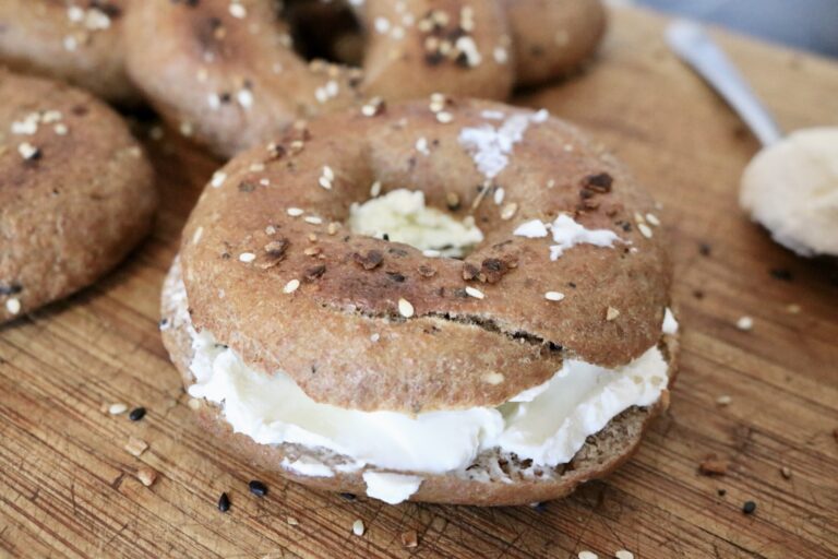 one healthy whole grain bagel sandwich with cream cheese