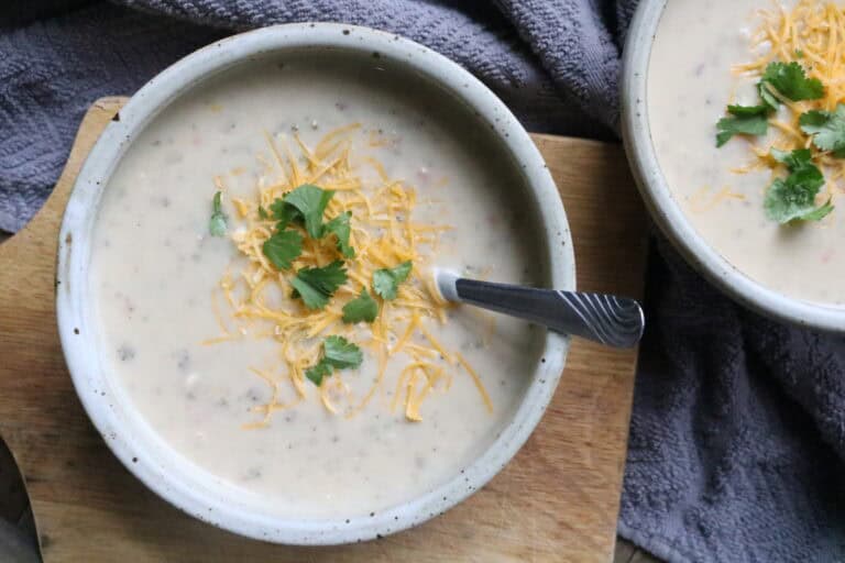 creamy potato vegetable soup in bowls