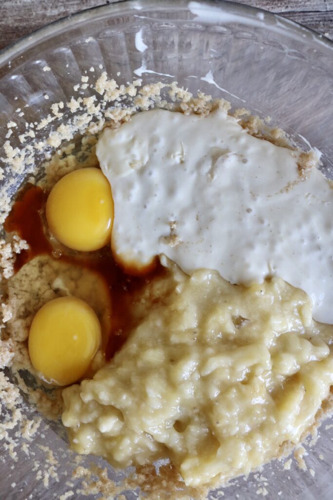 mashed banana egg and sourdough starter in a bowl