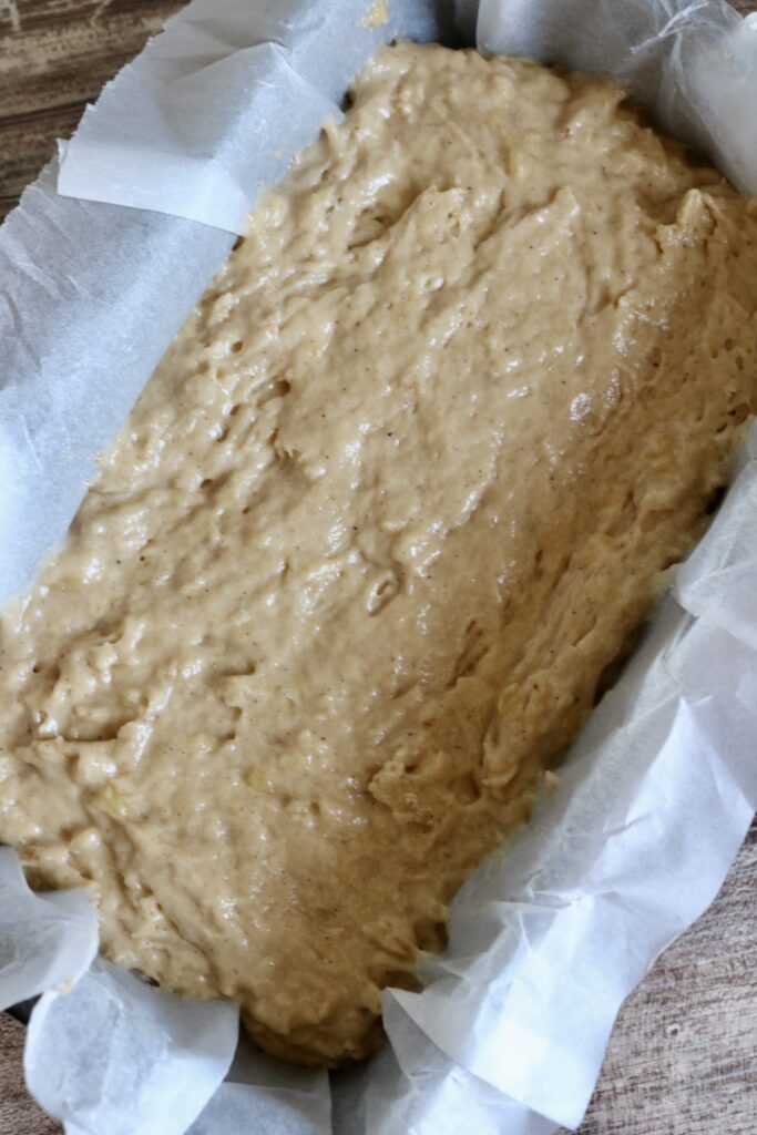 banana bread batter in a loaf pan