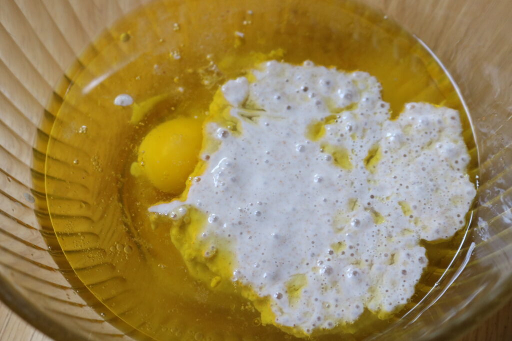 liquid ingredients in a glass mixing bowl