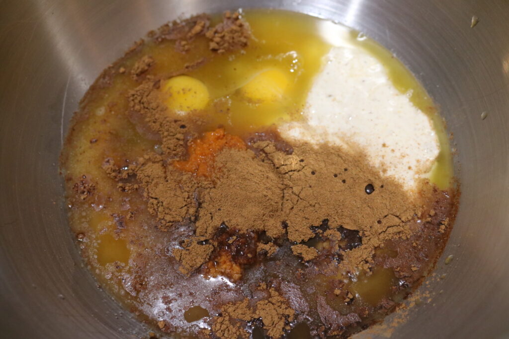 eggs, spices, and starter in a mixing bowl