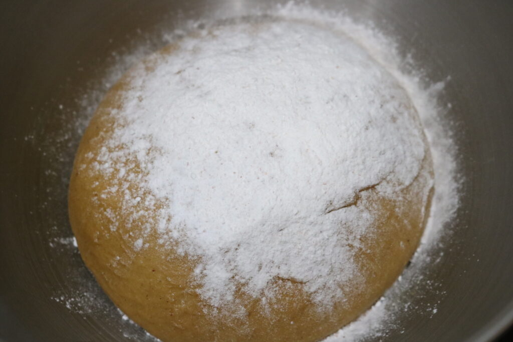ball of dough with baking powder on top