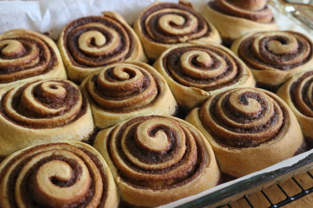 full pan of baked cinnamon rolls