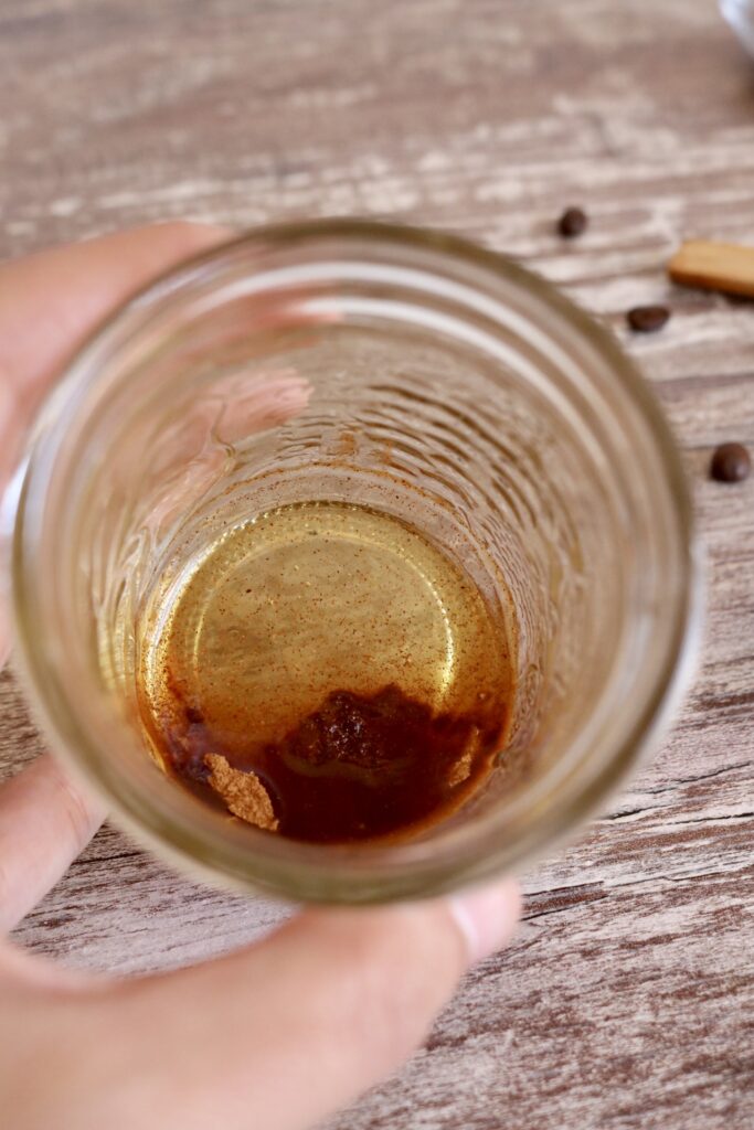 honey and cinnamon mixture in a half pint jar