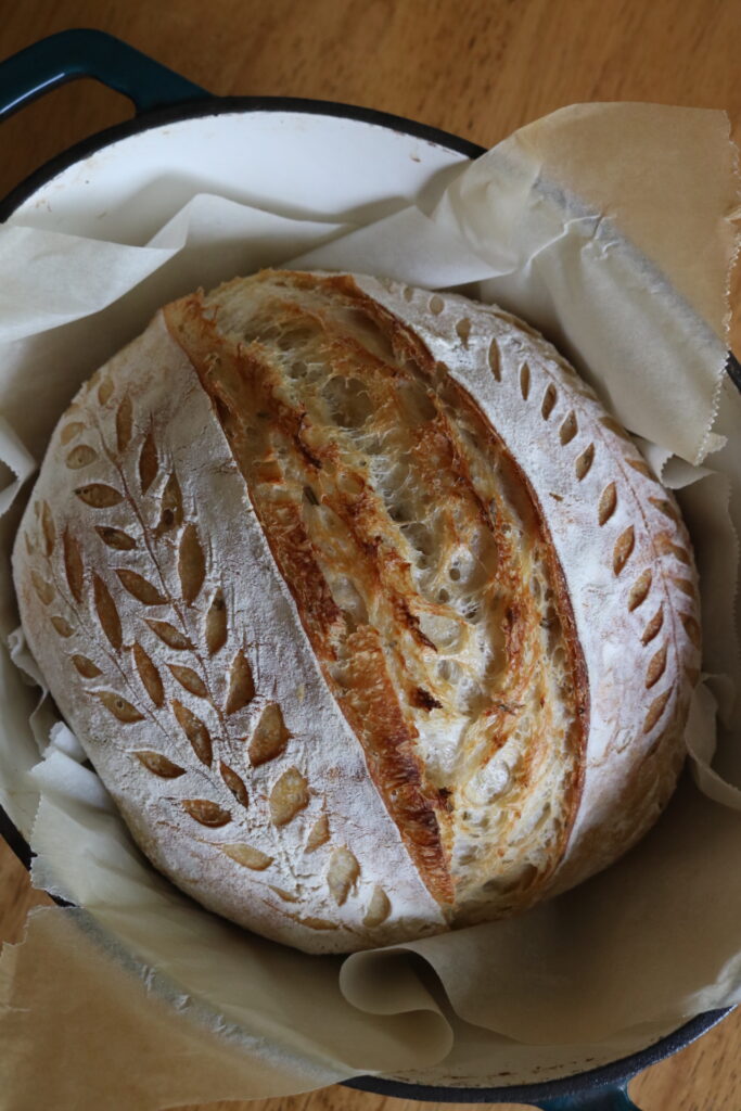baed sourdough loaf in a dutch oven