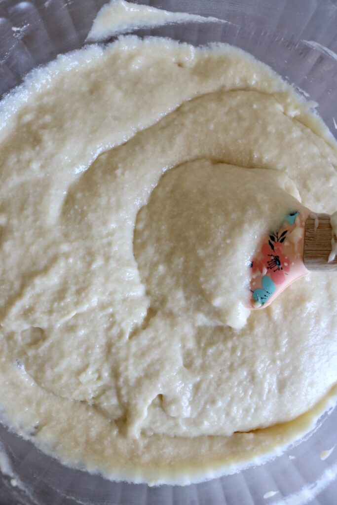 stirring cake batter with a spatula