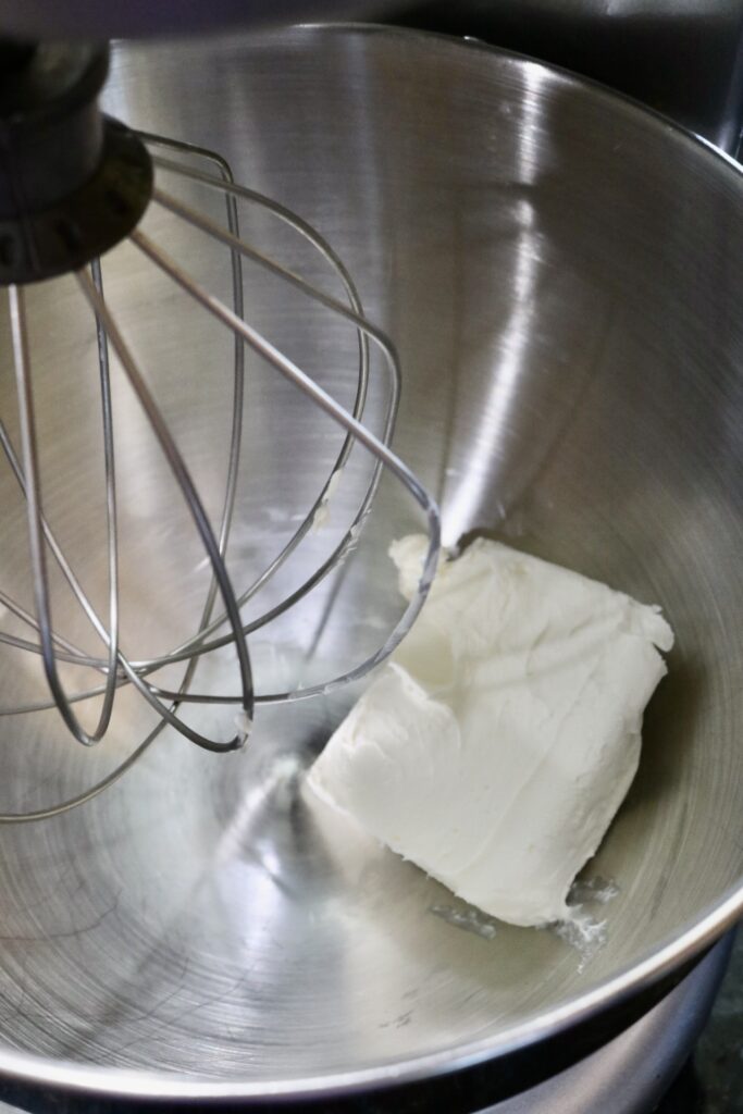 cream cheese in the bowl of a stand mixer