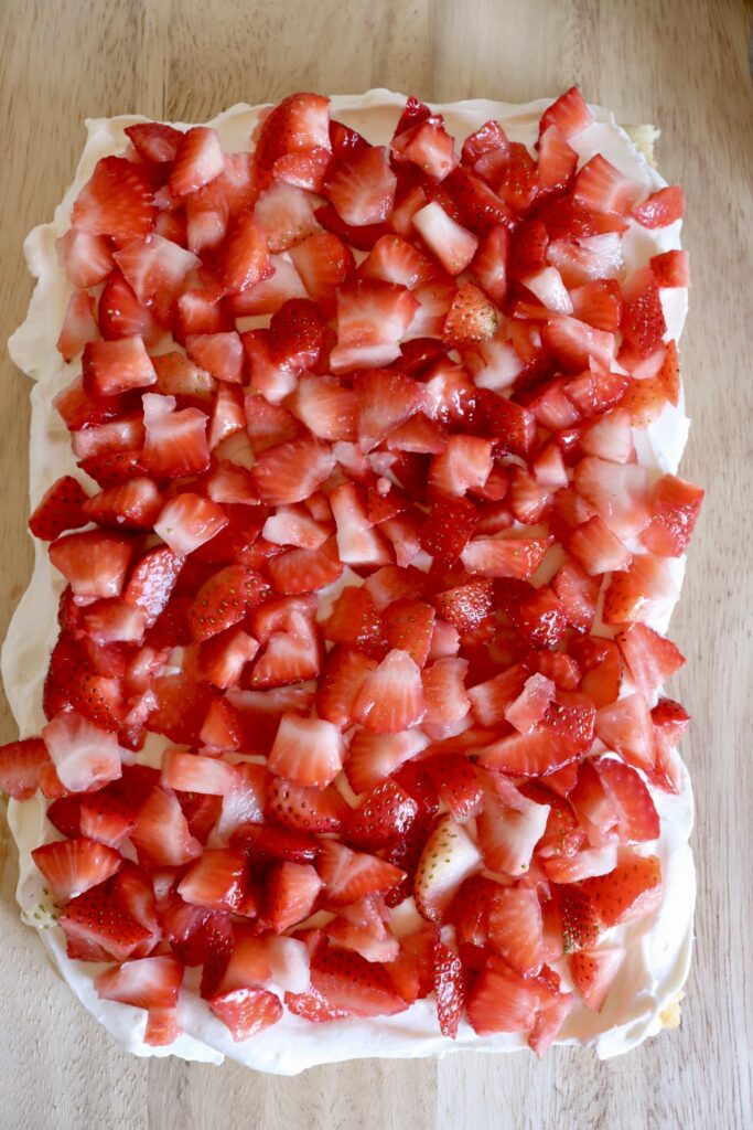 cake topped with diced strawberries