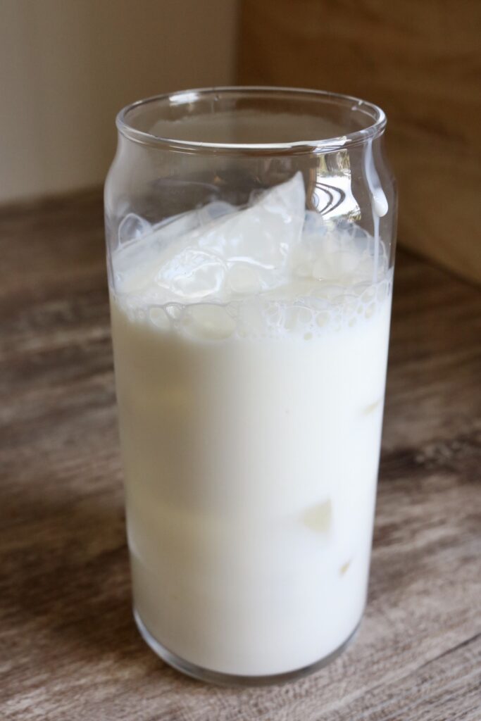milk and ice in a glass