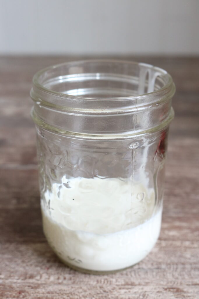 milk in a small glass jar