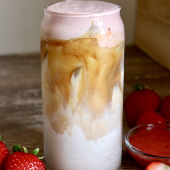 iced latte with strawberry cold foam on top