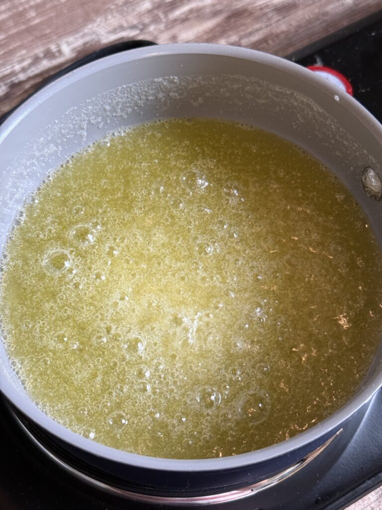 melted butter boiling in a saucepan