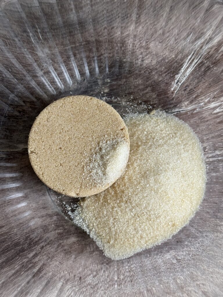 brown sugar and cane sugar in a glass bowl