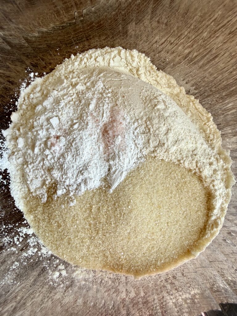 flour sugar baking powder and salt in a glass bowl