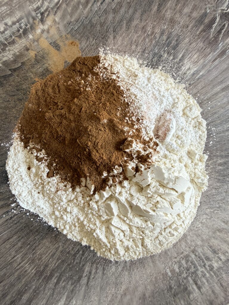 flour and cinnamon in a glass bowl