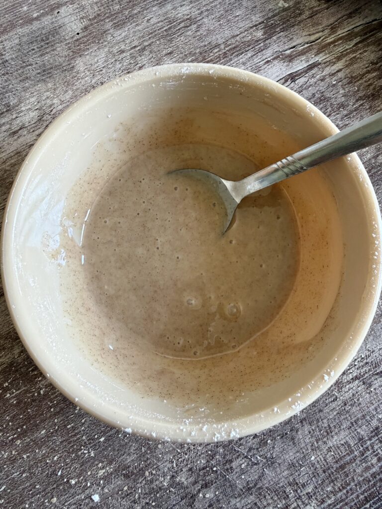 cinnamon glaze in a small brown bowl