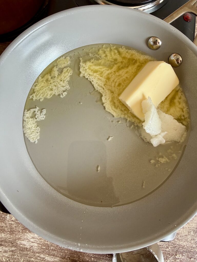 butter and coconut oil melting in a saucepan