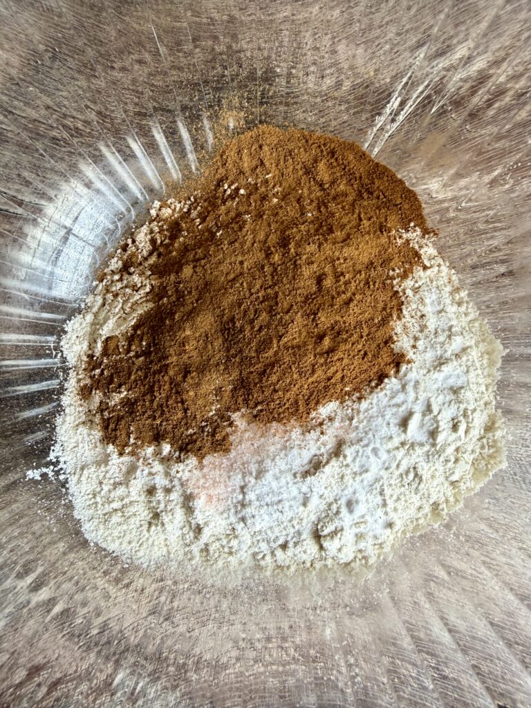 flour and cinnamon in a large glass bowl