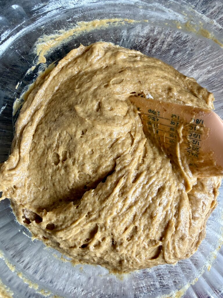 pumpkin bread batter with apin spatula in it